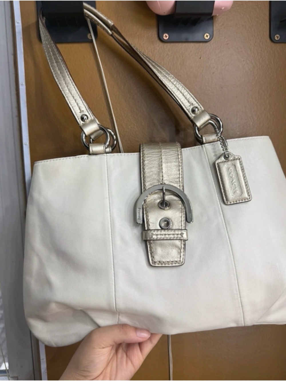 White and Gold Coach Buckle bag
